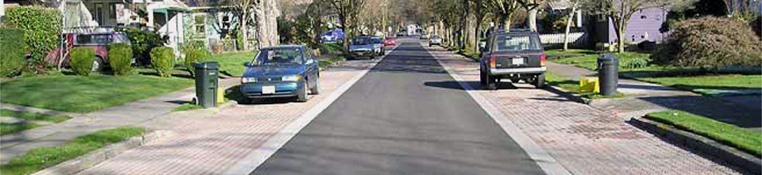 Three different types of permeable paving: asphalt, concrete, and pavers